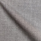 Nahaufnahme von der grauen Stoffprobe