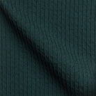Nahaufnahme Stoffprobe vom dunkelgrünen Seersucker Anzug