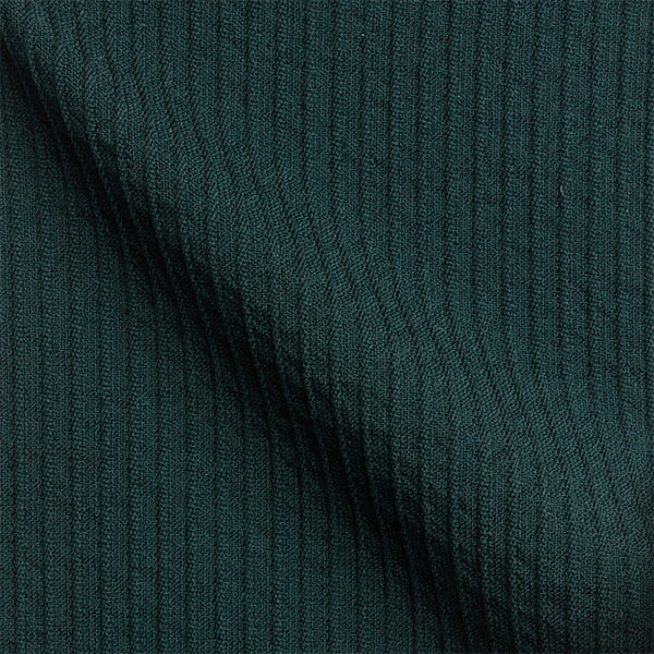 Nahaufnahme Stoffprobe vom dunkelgrünen Seersucker Anzug