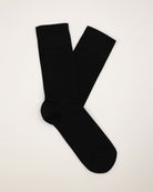 Socken in schwarz glatt liegend