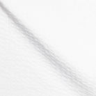 Detailaufnahme weißer Seersucker-Stoff, charakteristische gekreppte Waffle-Struktur, atmungsaktives Premium-Material für Seersucker Hemd Herren